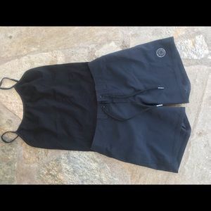 Cute swim shorts with a black tank top